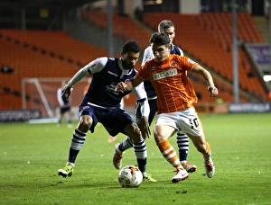 Battle for Supremacy: Edwards vs. Redshaw in Sky Bet League One Clash between Millwall and Blackpool