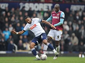 Images Dated 4th February 2012: Battle for Supremacy: Liam Trotter vs. Carlton Cole - Millwall vs