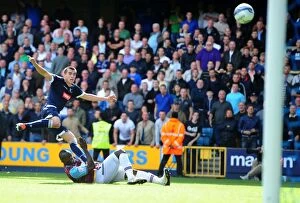Images Dated 17th September 2011: Battle for Supremacy: Marquis vs. Faye - Millwall vs. West Ham United