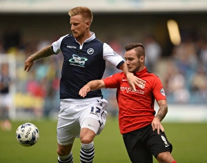 Battle for Supremacy: Webster vs. Armstrong in Millwall vs. Coventry City's Sky Bet League One Clash at The New Den