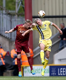 Bradford City vs Millwall: Intense Aerial Battle Between Steve Morison and Nathan Clarke in Play-Off First Leg