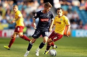 Images Dated 1st October 2011: Clash at The Den: Millwall vs. Burnley - Ross Wallace vs. Scott Barron in Championship Battle