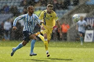 Clash at the Ricoh: Coventry City vs. Millwall - Sky Bet League One: Intense Moment between Marcus Tudgay and Mark Beevers