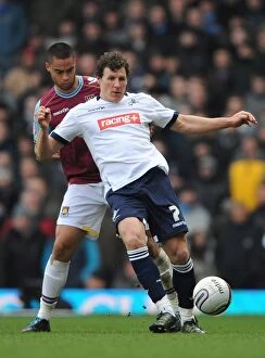 Images Dated 4th February 2012: Clash at Upton Park: West Ham United vs. Millwall in Npower Championship Action - Reid