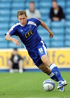 Images Dated 18th August 2009: David Martin's Unyielding Performance: Millwall vs Oldham Athletic in Football League One