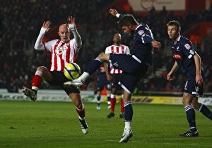 Images Dated 7th February 2012: FA Cup: Southampton vs. Millwall - Fourth Round Replay Showdown between Chaplow and Barron