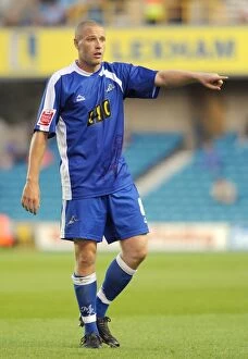 Images Dated 18th August 2009: Gary Alexander's Thrilling Performance: Millwall vs Oldham Athletic in Football League One