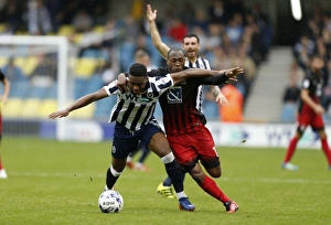 Intense Rivalry: Mahlon Romeo vs Kyel Reid Battle for Ball Supremacy in Millwall vs Coventry City, Sky Bet League One