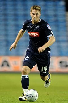 17-08-2011 v Peterborough United, The Den Collection: James Henry Scores: Millwall vs Peterborough United in Npower Championship 2011-2012 at The Den