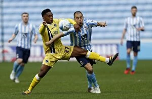 Images Dated 16th April 2016: Mahlen Romeo vs. Joe Cole: Intense Rivalry in Sky Bet League One - Coventry City vs