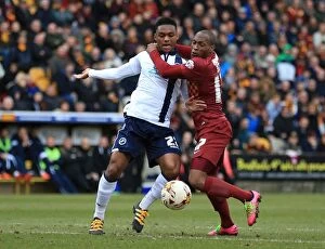 Images Dated 26th March 2016: Mahlon Romeo vs Kyel Reid: Intense Battle for the Ball in Millwall's Sky Bet League One Clash with