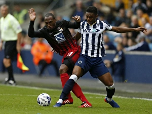 Mahlon Romeo vs Kyel Reid: Intense Battle for the Ball in Millwall vs Coventry City, Sky Bet League One