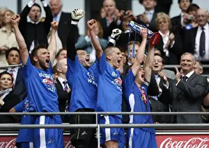Millwall V Swindon League One Play-off Final Prints: Millwall Football Club Celebrate Promotion to League One with Play-Off Final Win at Wembley (The Trophy Lift)