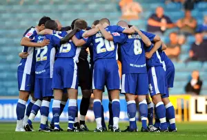 Millwall Players Unite in Huddle during Coca-Cola Football League One Match against Oldham Athletic at The New Den