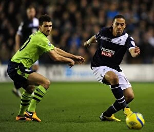 Images Dated 25th January 2013: Millwall vs Aston Villa: FA Cup Fourth Round Clash - Feeney vs Lichaj Battle at The Den