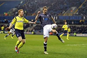 Season 2013-14 Prints: Millwall vs Birmingham City: Robinson Clears the Threat at The Den (Sky Bet Championship)