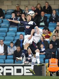 Images Dated 23rd April 2013: Millwall vs. Blackburn Rovers: A Battle for Championship Possession - The Den