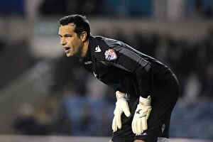 Images Dated 17th September 2013: Millwall vs Blackpool: David Forde Saves the Day at The Den (Sky Bet Championship, 17-09-2013)