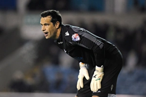 Season 2013-14 Prints: Millwall vs Blackpool: David Forde Saves the Day at The Den (Sky Bet Championship)