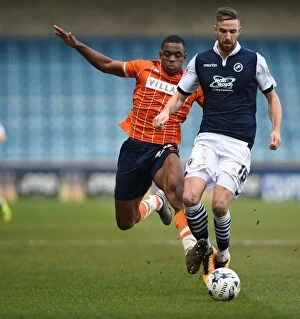 Images Dated 5th March 2016: Millwall vs Blackpool: Intense Battle – Sid Nelson vs Uche Ikpeazu (Sky Bet League One)