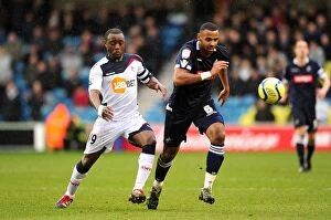 Images Dated 18th February 2012: Millwall vs. Bolton Wanderers: Fifth Round FA Cup Clash - Intense Battle Between Nigel Reo-Coker