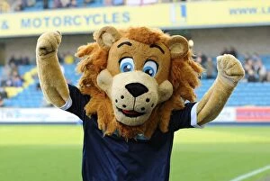 Images Dated 20th November 2011: Millwall vs. Bristol City: The Den - Roaring in the Npower Championship with Zampa the Lion