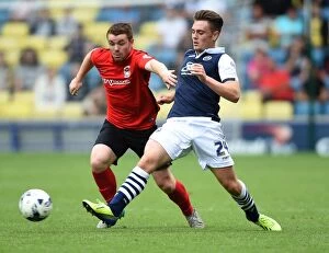 Images Dated 15th August 2015: Millwall vs Coventry City: A Battle in Sky Bet League One at The New Den - Ben Thompson vs John