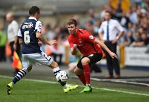 Images Dated 15th August 2015: Millwall vs Coventry City: A Fierce Battle in Sky Bet League One at The New Den - Williams vs Stokes