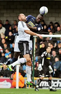 2010-11 Season Prints: Millwall vs. Derby County: A Championship Battle - Shittu vs. Kuqi at The New Den