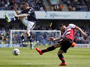 Season 2013-14 Prints: Millwall vs Doncaster Rovers: Lee Martin vs Dean Furman in Sky Bet Championship Clash at The New Den