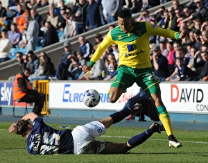 Millwall vs Norwich City: Sid Nelson Tackles Martin Olsson in Sky Bet Championship Action at The Den
