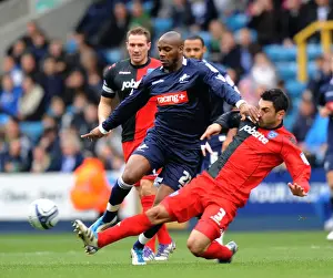 Season 2011-12 Prints: Millwall vs Portsmouth: Intense Battle – Guessan vs Rocha in Npower Championship Match at The Den (26-12-2011)