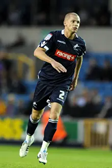 Previous Season Prints: Millwall's Alan Dunne in Action: Npower Championship Showdown against Peterborough United at The Den (August 17)