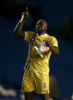 Millwall's Championship Glory: Danny Shittu's Triumphant Celebration vs. Brighton & Hove Albion