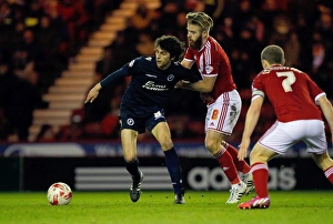 Millwall's Diego Fabbrini Fends Off Middlesbrough's Adam Clayton in Sky Bet Championship Clash at Riverside Stadium