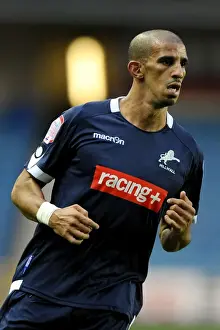 Previous Season Prints: Millwall's Hameur Bouazza in Action Against Peterborough United (2011)