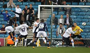 Season 2012-13 Prints: Millwall's Karleigh Osborne Scores Opening Goal Against Blackburn Rovers in Championship Match at The Den (April 23)