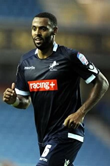 Images Dated 17th August 2011: Millwall's Liam Trotter in Action at The Den against Peterborough United (Npower Championship)