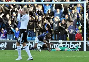 Millwall's Theo Robinson Scores Dramatic Diving Header Against Derby County in Championship Match at The New Den