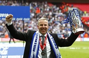 Millwall's Triumph: Kenny Jackett and The Lions Celebrate Promotion to League One with the Play-Off Trophy at Wembley