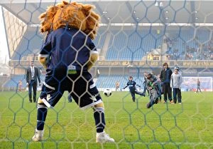 Images Dated 20th November 2011: Millwall's Zampa the Lion Roars in Penalty Shootout at The Den vs. Bristol City