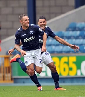 Images Dated 30th August 2014: Scott McDonald's Thrilling First Goal for Millwall: Jubilant Team Celebration against Blackpool