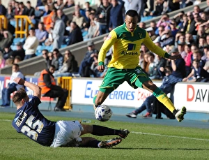 Sid Nelson vs Martin Olsson: Intense Tackle in Millwall vs Norwich City Championship Clash at The Den