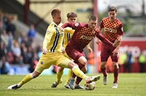 Sky Bet League One - Bradford City v Millwall - Play Off - First Leg - Coral Windows Stadium Collection: Webster vs Proctor: Intense Rivalry in Millwall vs Bradford City Play-Off Clash