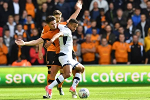 Wolverhampton Wanderers vs Millwall: Intense Battle for Possession - Ben Marshall vs James Meredith